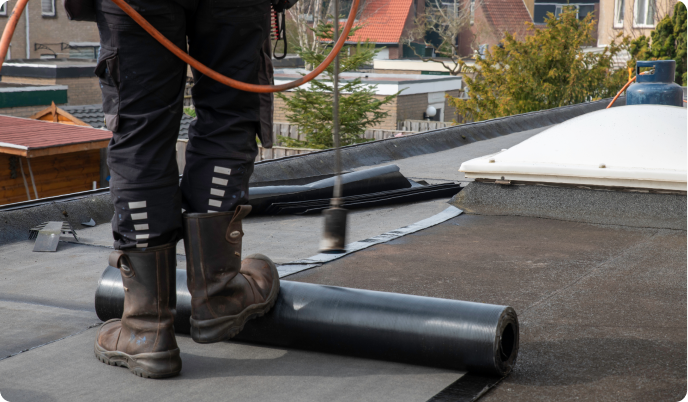 Roofing team working on a project